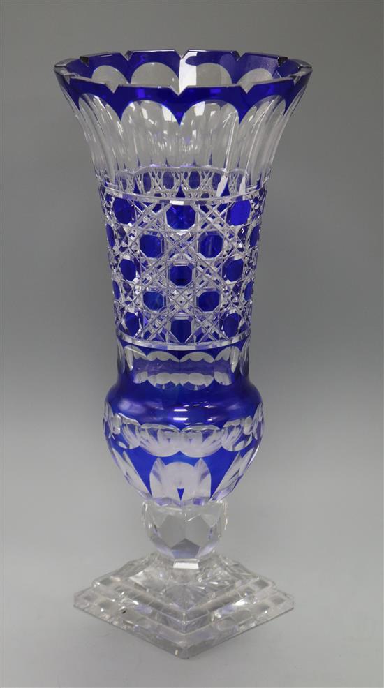 A large blue overlaid cut glass vase height 41cm